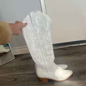 Tall white western boots